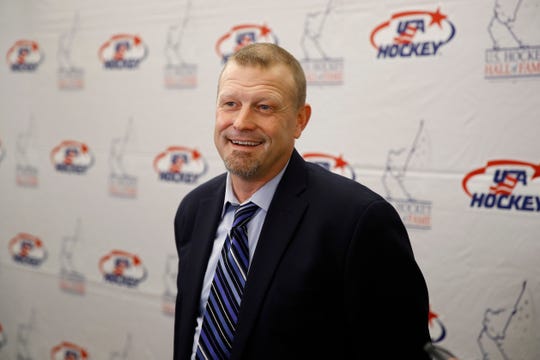 Former Boston Bruins goalie Tim Thomas speaks with members of the media before being inducted into the U.S. Hockey Hall of Fame, on Thursday.