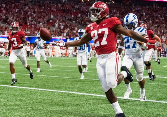 Alabama running back Jerome Ford (27) crosses the goal line for a score against Duke in the Chick-fil-A Kickoff Game at Mercedes Benz Stadium in Atlanta, Ga., on Saturday August 31, 2019.