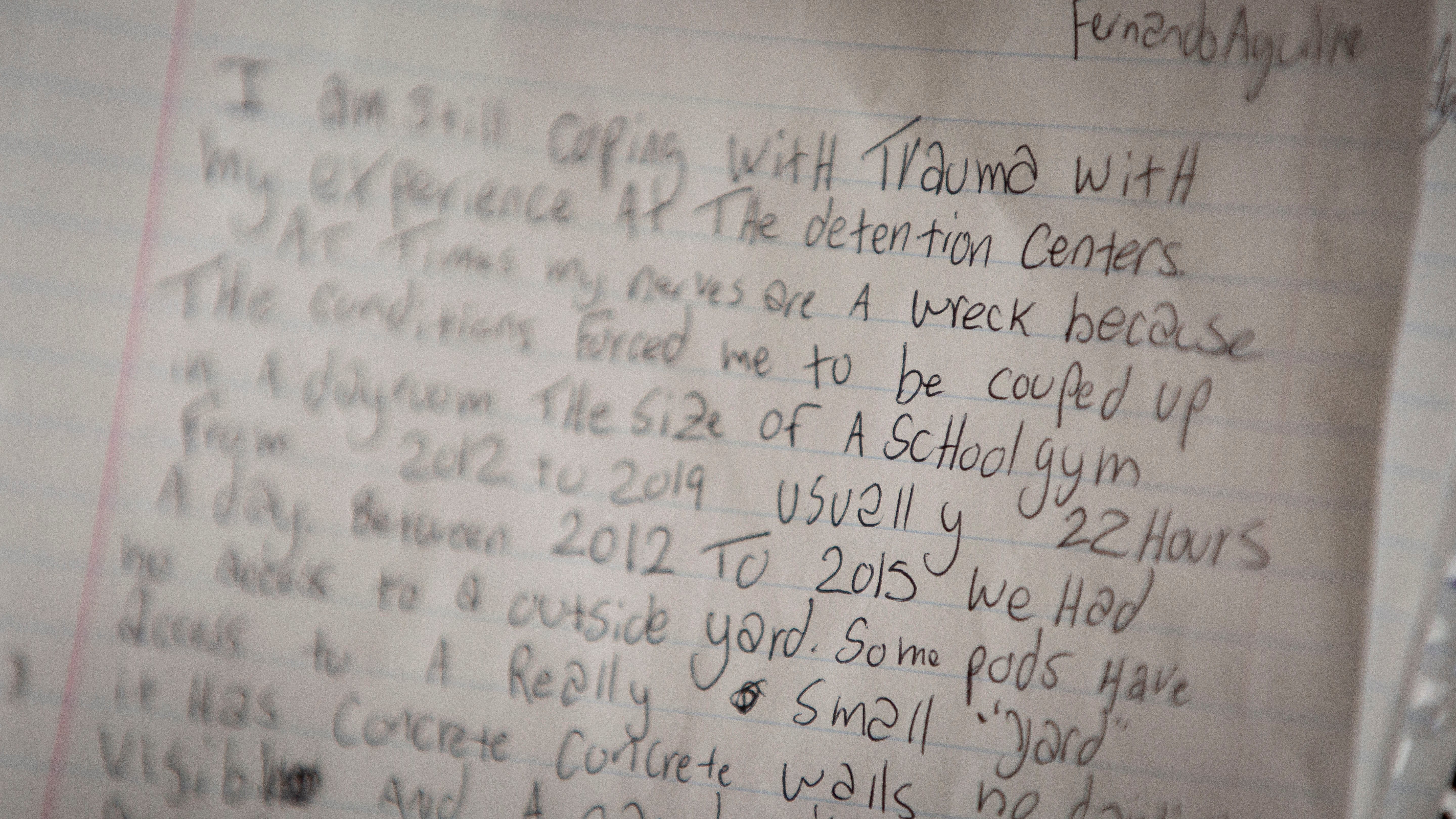 Fernando Aguirre looks through notes he made about his time in detention at his home in Kennewick, Washington, Dec. 8, 2019. Aguirre pleaded guilty to drug possession and spent eight months (of a one year sentence) in jail. Once he completed his sentence, ICE took custody of him and he then spent seven years at the detention center in Tacoma awaiting his deportation.