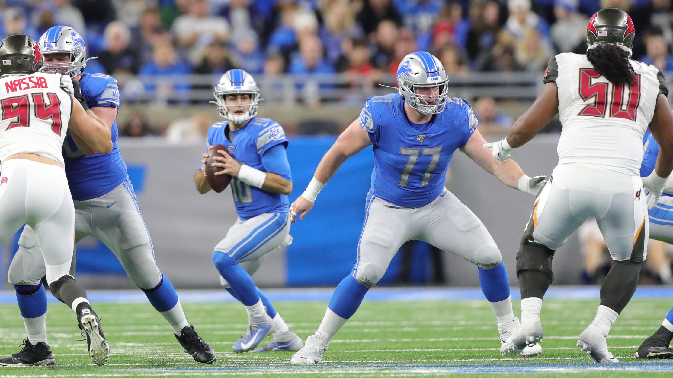 Detroit Lions center Frank Ragnow (77) protects quarterback David Blough during the second half vs. the Tampa Bay Buccaneers, Sunday, Dec. 15, 2019 at Ford Field.