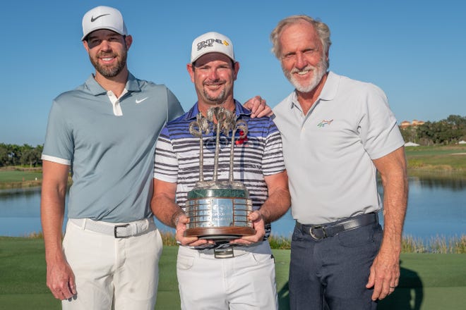 Kevin Tway, left, and Rory Sabbatini, who won the QBE Shootout, pose with tournament founder and host Greg Norman on Sunday, Dec. 15, 2019.