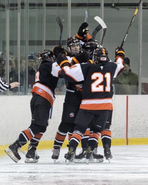 Brother Rice celebrated one of its four goals against Hartland in the KLAA/MIHL Showcase.