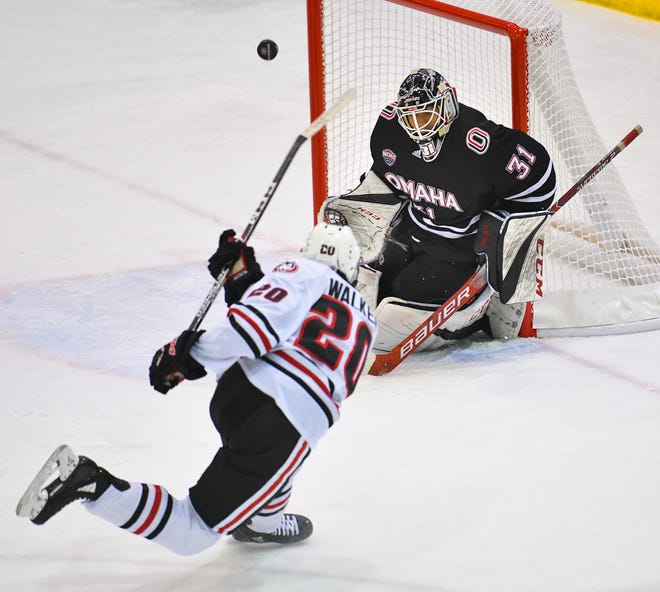 St. Cloud State's Nolan Walker takes a shot on UNO goaltender Isaiah Saville during the first period of the Saturday, Dec. 14, 2019, game at the Herb Brooks National Hockey Center in St. Cloud. 