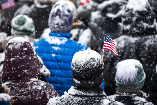 Supporters listen as US Senator Amy Klobuchar (D-MN) announces her candidacy for president during a heavy snowfall on February 10, 2019 in Minneapolis, Minnesota.