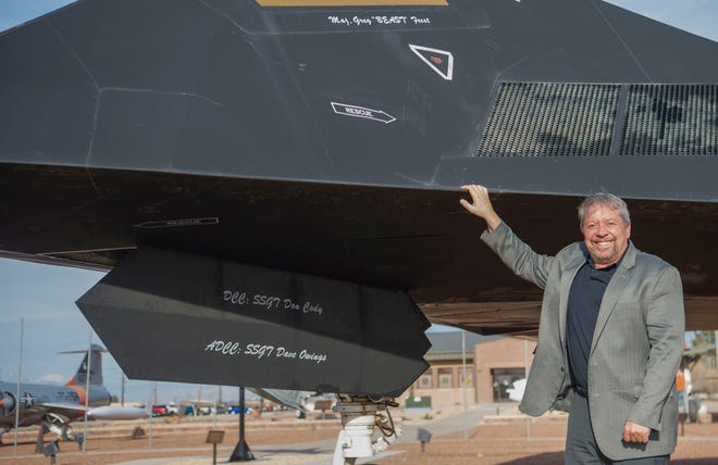 Retired Maj. Gen. Gregory Feest, National Commission on Military Aviation Safety executive director, poses for a photo in front of the F-117 Nighthawk dedicated to him on Holloman Air Force Base, N.M, Dec. 11, 2019. Feest was an F-117 pilot previously stationed at Holloman.