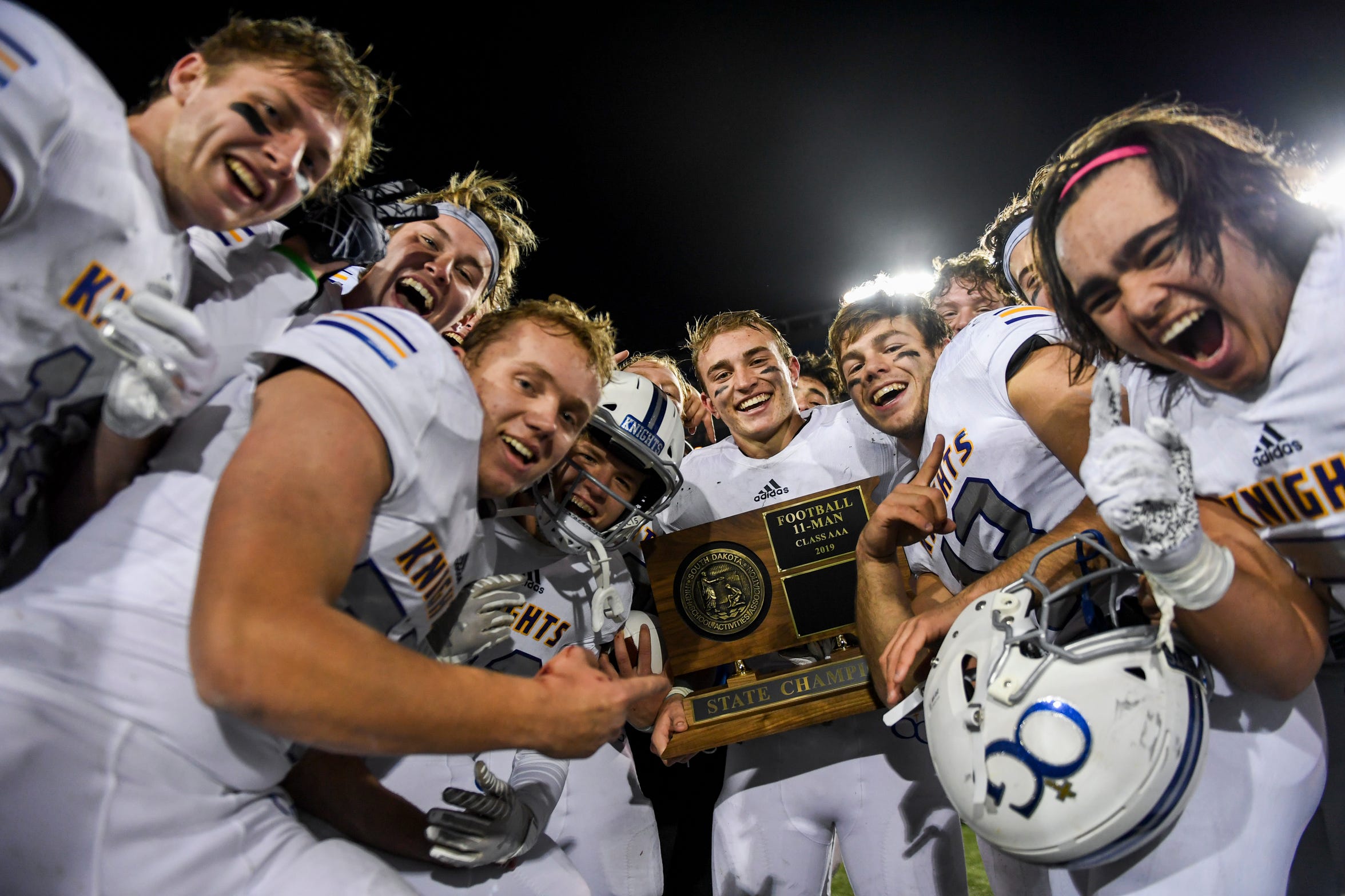 The O'Gorman Knights celebrate winning the Class 11AAA state championship against Brandon Valley on Friday, Nov. 15, 2019 at Dana J. Dykhouse Stadium in Brookings. The final score of the game was 21-16.