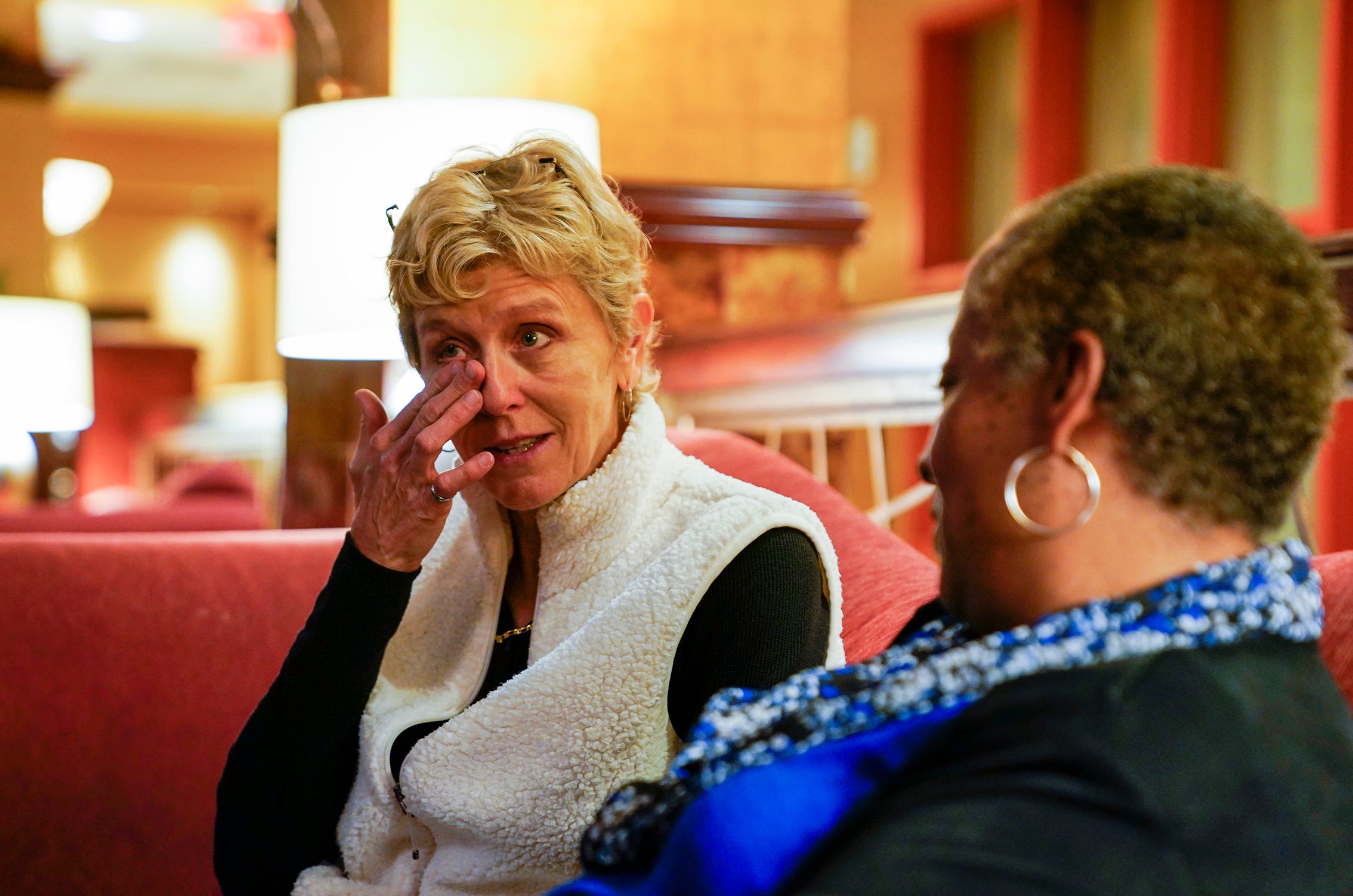  Pam Tucker sheds a tear while talking to Wanda Tucker during their first face to face conversation.