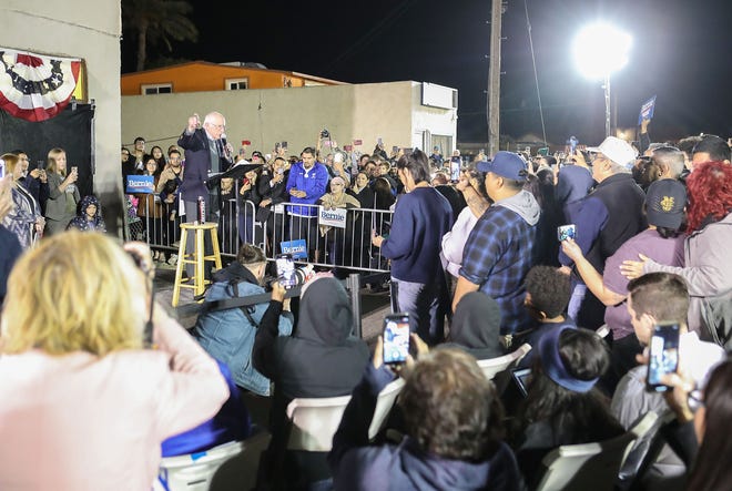 Bernie Sanders addresses a crowd during a brief campaign rally in Coachella, December 16, 2019.