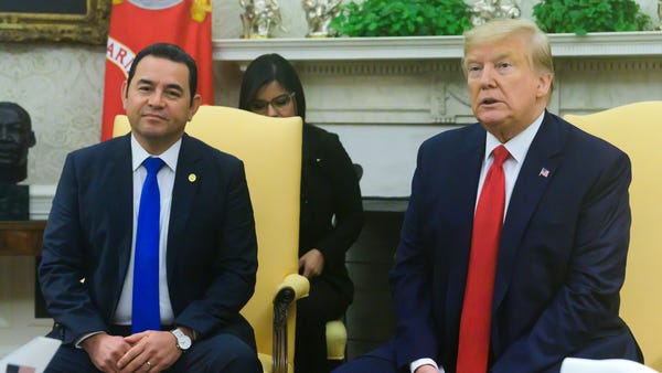 US President Donald J. Trump makes remarks as he w