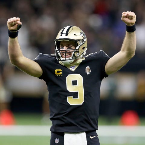 New Orleans Saints quarterback Drew Brees (9) reac