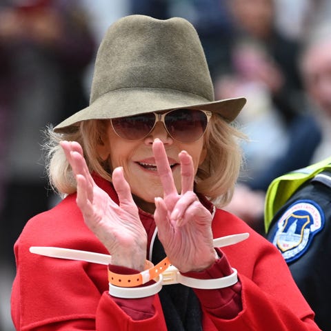 Jane Fonda is arrested by Capitol Police during a 