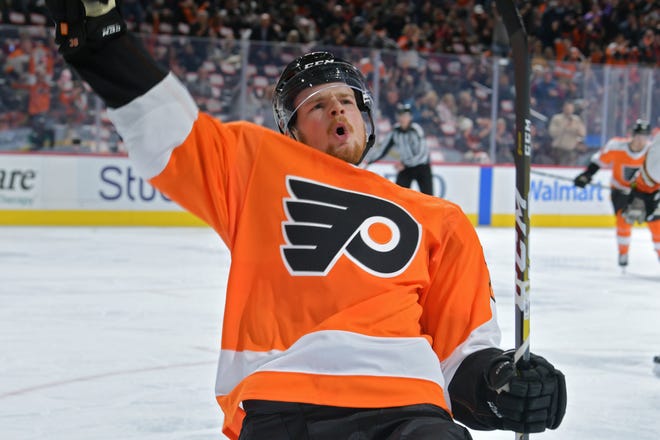 PHILADELPHIA, PA - DECEMBER 17: David Kase #72 of the Philadelphia Flyers celebrates his first NHL goal during the game against the Anaheim Ducks in the second period at Wells Fargo Center on December 17, 2019 in Philadelphia, Pennsylvania. (Photo by Drew Hallowell/Getty Images)