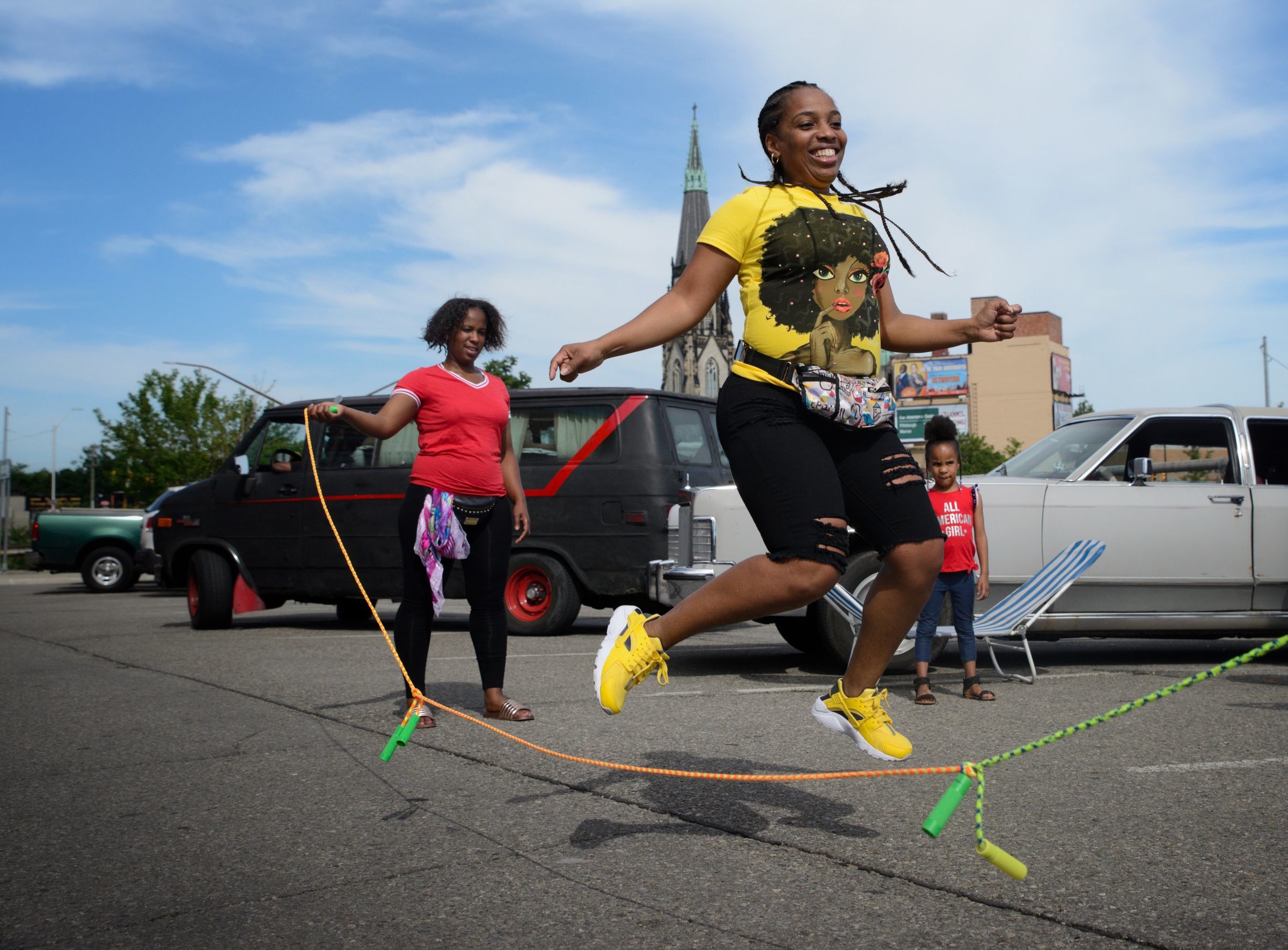 Mina Powell of Southfield skips rope at Eastern Market before the 2018 Ford Fireworks in Detroit on Monday, June 25, 2018.