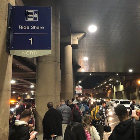 Crowds outside the 1 North Ride Share pickup locat