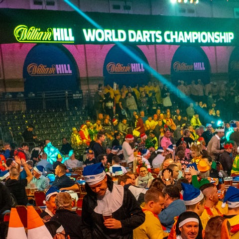Darts fans in the main competition arena during th