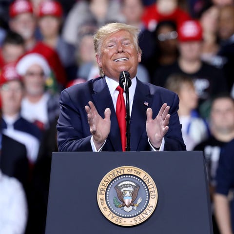 President Trump talks during the Merry Christmas R