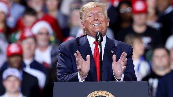 President Trump talks during the Merry Christmas R