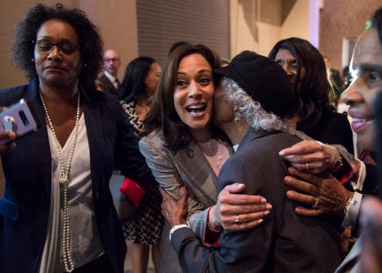 2020 Presidential candidate Sen. Kamala Harris (D-Ca.) gets a kiss from a supporter during the Alabama Democratic Conference convention at the Renaissance Hotel in Montgomery, Ala., on Saturday, June 8, 2019. 