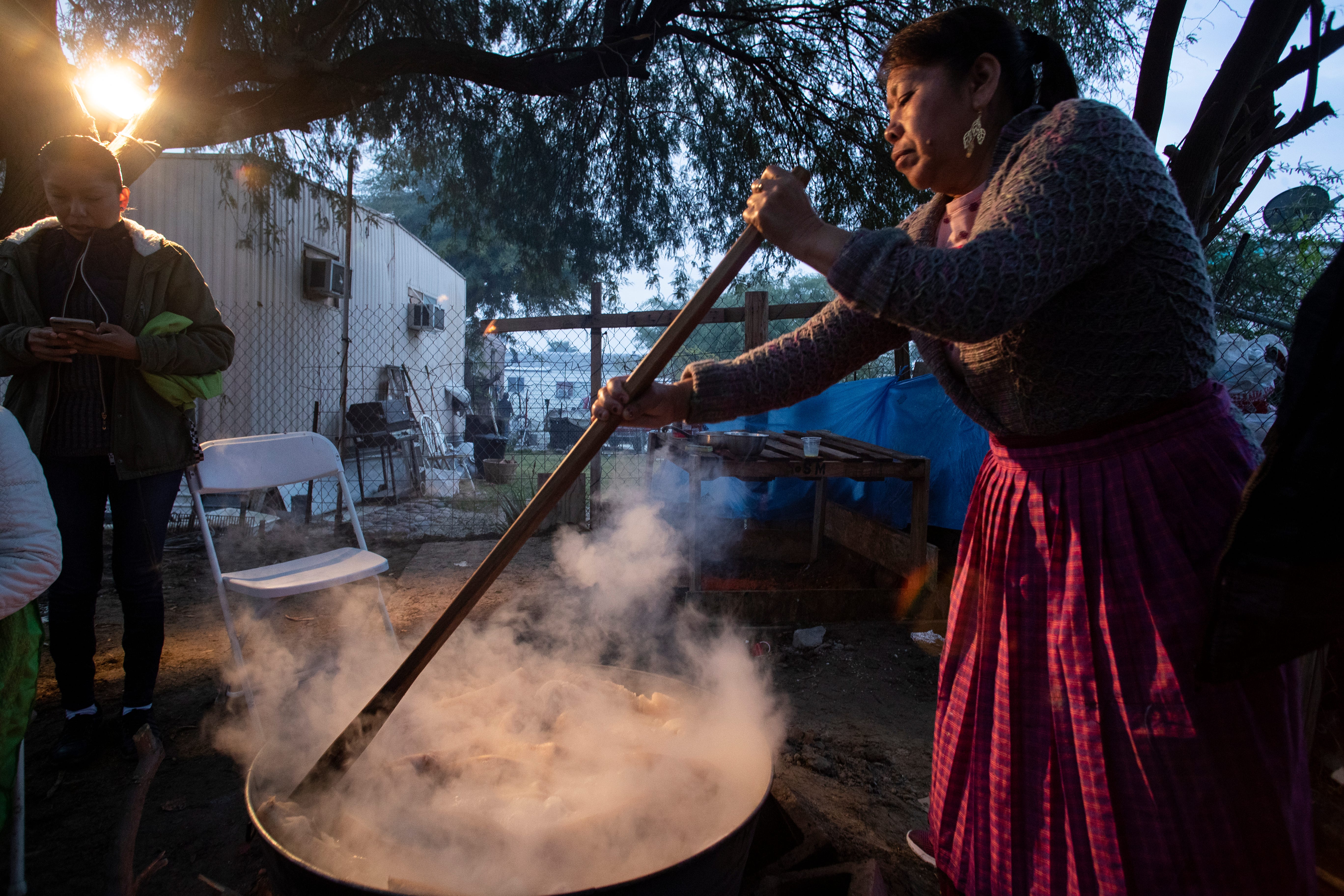 Florinda Serano begins preparing food at the break of dawn on Dec. 10, 2019, to feed the Purépecha community in Thermal, Calif. The community will gather to celebrate the Virgin of Guadalupe festivities.