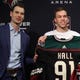 PHOENIX, ARIZONA - DECEMBER 18: (L-R) General manager John Chayka and Taylor Hall of the Arizona Coyotes pose together during a introductory press conference at Gila River Arena on December 18, 2019 in Glendale, Arizona. (Photo by Christian Petersen/Getty Images)