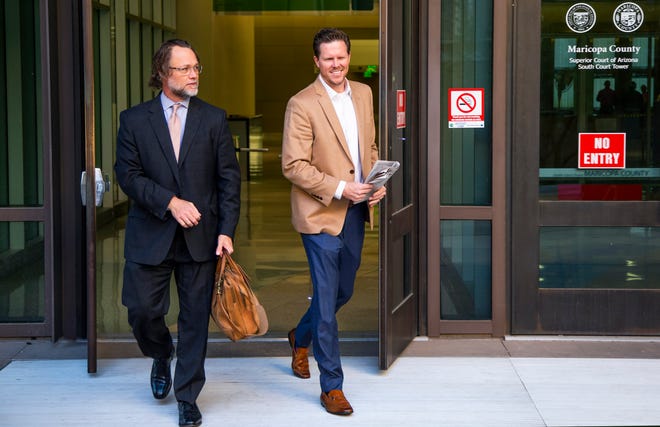 Paul Petersen leaves Maricopa County Superior Court with his attorney, Kurt Altman, left, on Dec. 19, 2019.