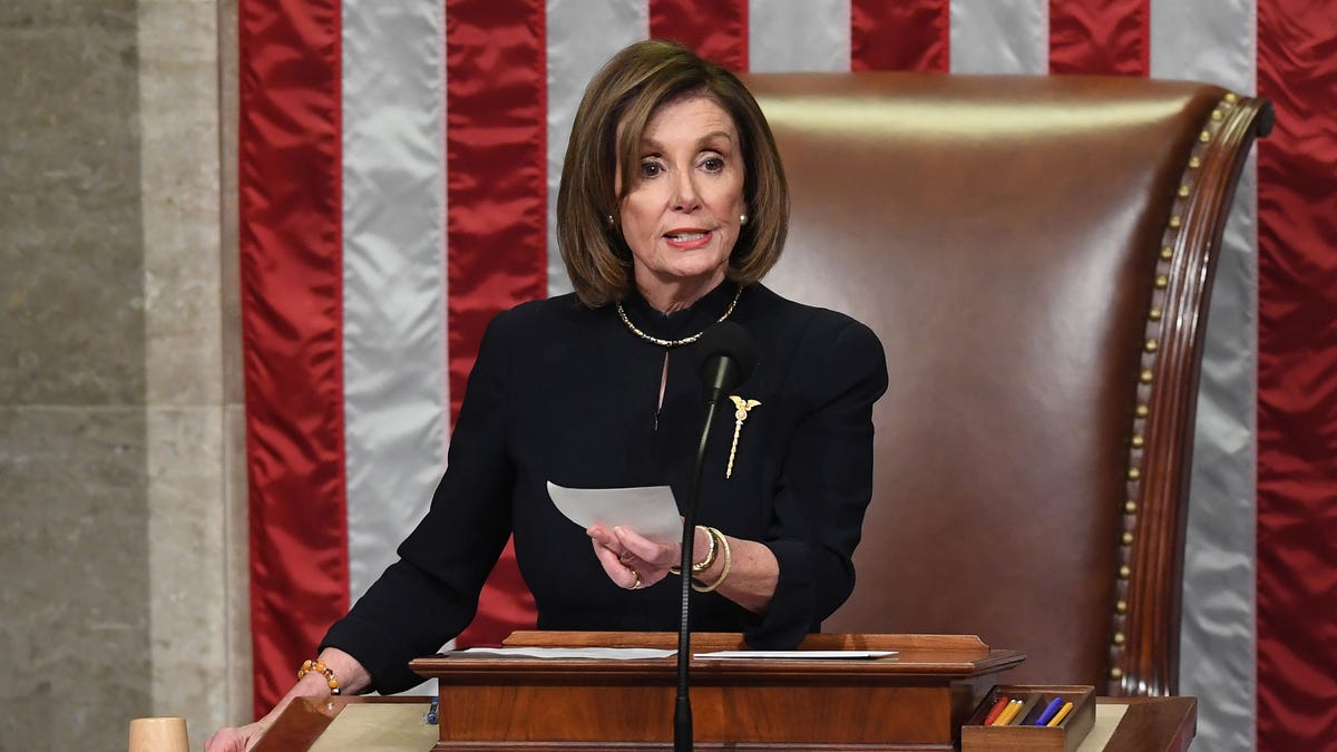 US Speaker of the House Nancy Pelosi presides over Resolution 755, Articles of Impeachment Against President Donald J. Trump as the House votes at the US Capitol in Washington, DC, on December 18, 2019.