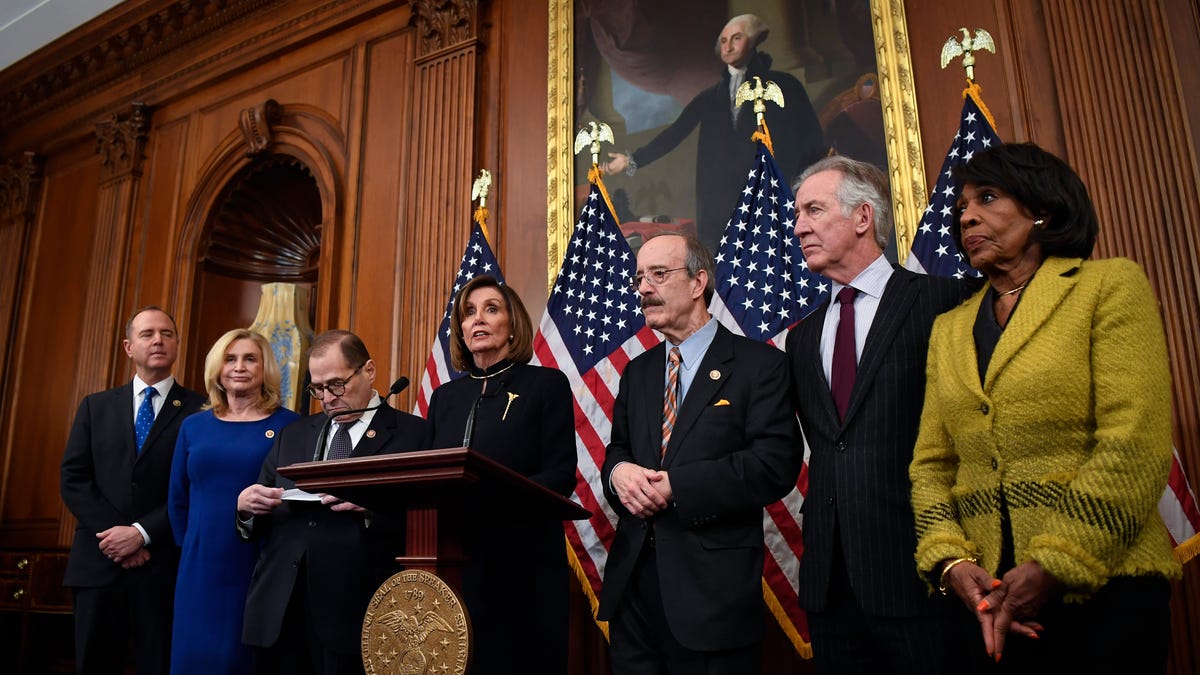 Speaker of the House Nancy Pelosi (D-CA), center, joins House Leadership including Judiciary Committee Chairman Jerry Nadler (D-NY), third from left, and House Intelligence Committee Chairman Adam Schiff, left, at a press conference on Dec. 18, 2019 following the vote by House of Representatives on the articles of impeachment against Donald J. Trump.