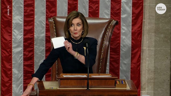 Nancy Pelosi gives stern glare, wave after announc
