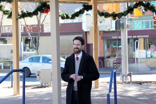 Director of ORII and Economic Development Warren Unsicker looks on at the groundbreaking ceremony for the Complete Streets Project in Orchard Park in downtown Farmington on Dec. 20, 2019.