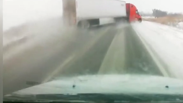This truck lost control and slid off this slippery