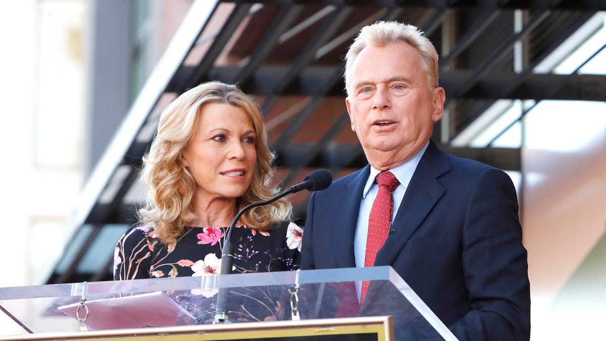 epa07965663 US game show hosts Vanna White (L) and Pat Sajak attend a ceremony honoring US game show producer Harry Friedman (unseen) with a star on the Hollywood Walk of Fame, in Los Angeles, California, USA, 01 November 2019. Friedman received the 2680th star on the Hollywood Walk of Fame, dedicated in the category of Television.  EPA-EFE/NINA PROMMER ORG XMIT: NPX01