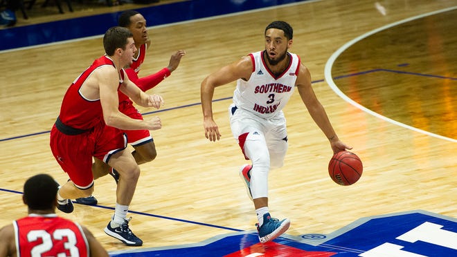 USI junior Mateo Rivera looks to pass during Saturday's men's basketball game against King.