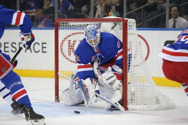Dec 20, 2019; New York, NY, USA; New York Rangers goalie Alexandar Georgiev (40) makes a save against the Toronto Maple Leafs during the first period at Madison Square Garden. Mandatory Credit: Brad Penner-USA TODAY Sports