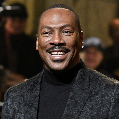 Host Eddie Murphy (second from right) was joined b