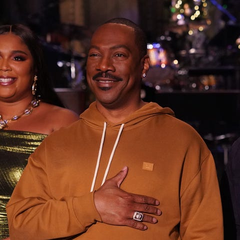 Eddie Murphy (center, with musical guest Lizzo and