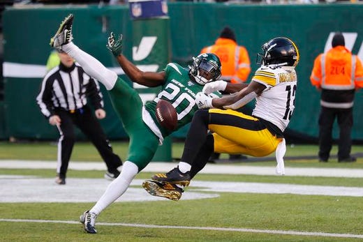 New York Jets free safety Marcus Maye (20) breaks up a pass intended for Pittsburgh Steelers wide receiver James Washington (13) in the second half of an NFL football game, Sunday, Dec. 22, 2019, in East Rutherford, N.J. (AP Photo/Adam Hunger)