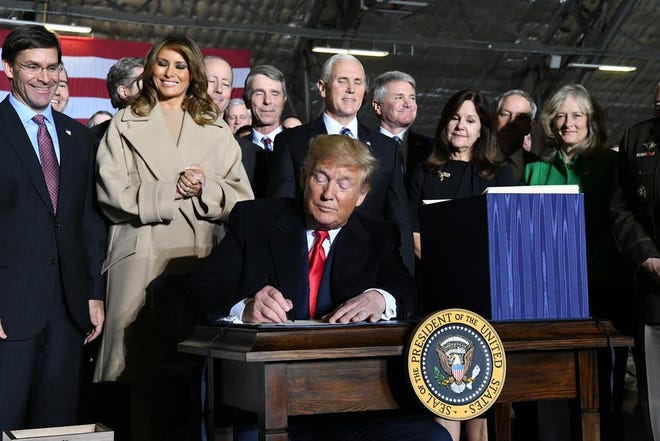 President Donald Trump the National Defense Authorization Act Friday, Dec. 20, 2019. making the U.S. Space Force the 6th armed force of the America.