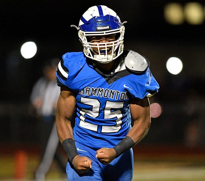 Hammonton's Jaiden Abrams celebrates after scoring a touchdown against visiting Jackson Memorial on Friday night. The Blue Devils defeated the Jaguars 28-12 to win the NJSIAA Central Group IV championship game on Nov. 22, 2019.