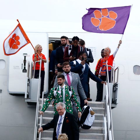 Clemson players arrive for the 2019 Fiesta Bowl at