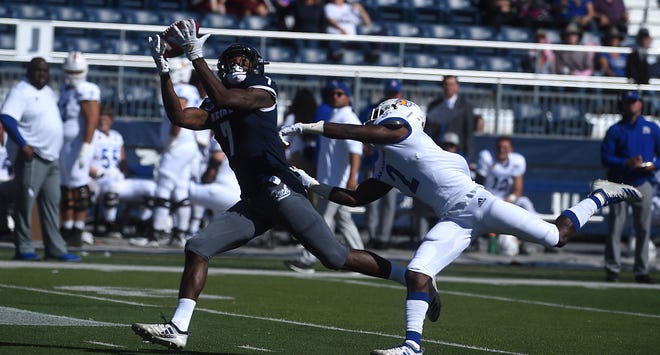 Wolf Pack receiver Romeo Doubs (7) goes for a catch against San Jose State's Zamore Zigler during last season's game at Mackay Stadium.