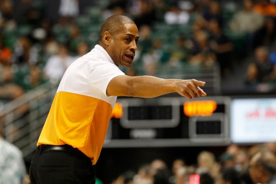 UTEP head coach Rodney Terry points towards his bench during the first half of an NCAA college basketball game against Hawaii Sunday, Dec. 22, 2019, in Honolulu. (AP Photo/Marco Garcia)