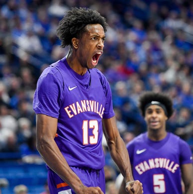 Evansville's DeAndre Williams (13) reacts to a first half basket as the University of Evansville Purple Aces play the number one ranked Kentucky Wildcats at Rupp Arena in Lexington Tuesday evening, November 12, 2019.