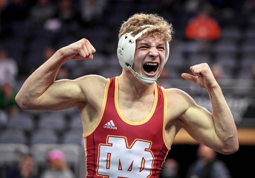 Gabe Sollars, Evansville Mater Dei, celebrates after defeating Tristan Ruhlman, Bloomington South, in the 1`60 weight class at the Indiana High School Athletic Association Semi-State Wrestling Tournament held at the Ford Center Saturday, February 9, 2019.