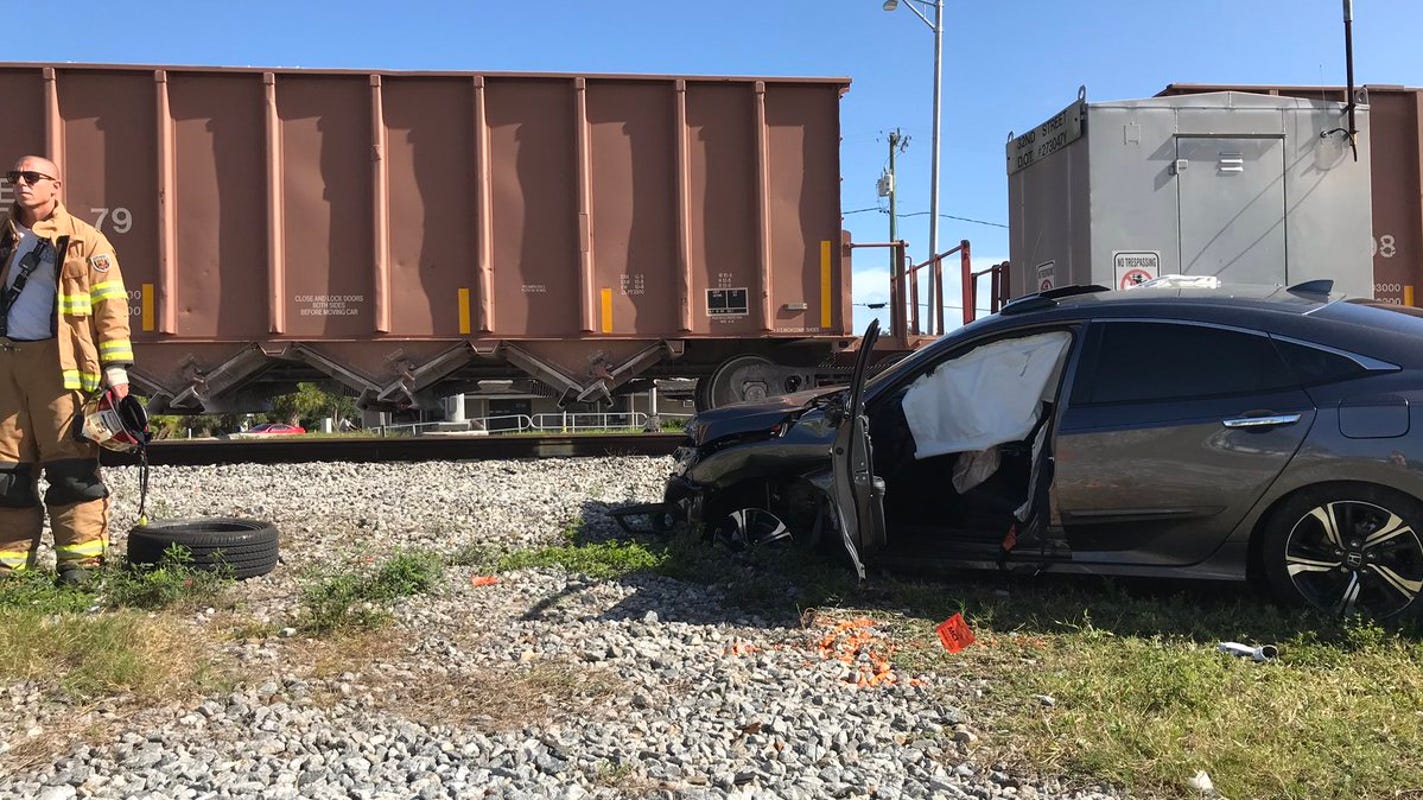 Car Goes Under Crossing Arm Gets Hit By Train In Vero Beach