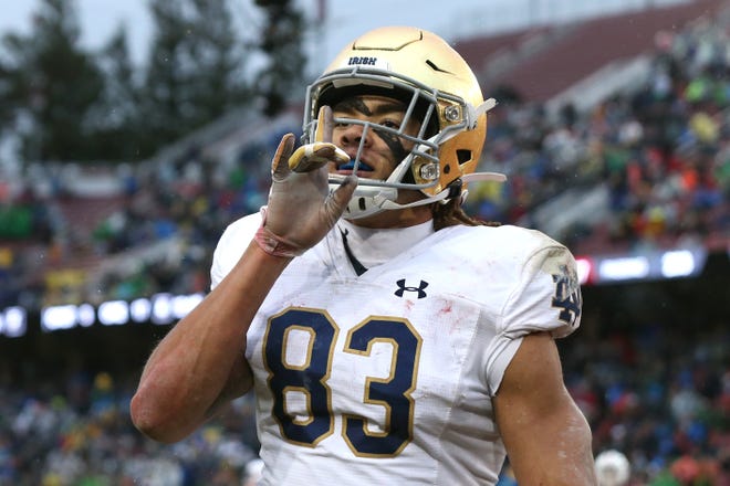 Notre Dame Fighting Irish wide receiver Chase Claypool (83) gestures to the crowd after scoring a touchdown during the third quarter against the Stanford Cardinal at Stanford Stadium.