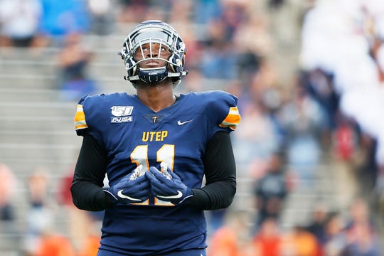 UTEP's Defensive Tackle Denzel Chukwukelu wipes his jersey off after a tackle against Nevada Saturday, Sept. 21, at the Sun Bowl in El Paso.