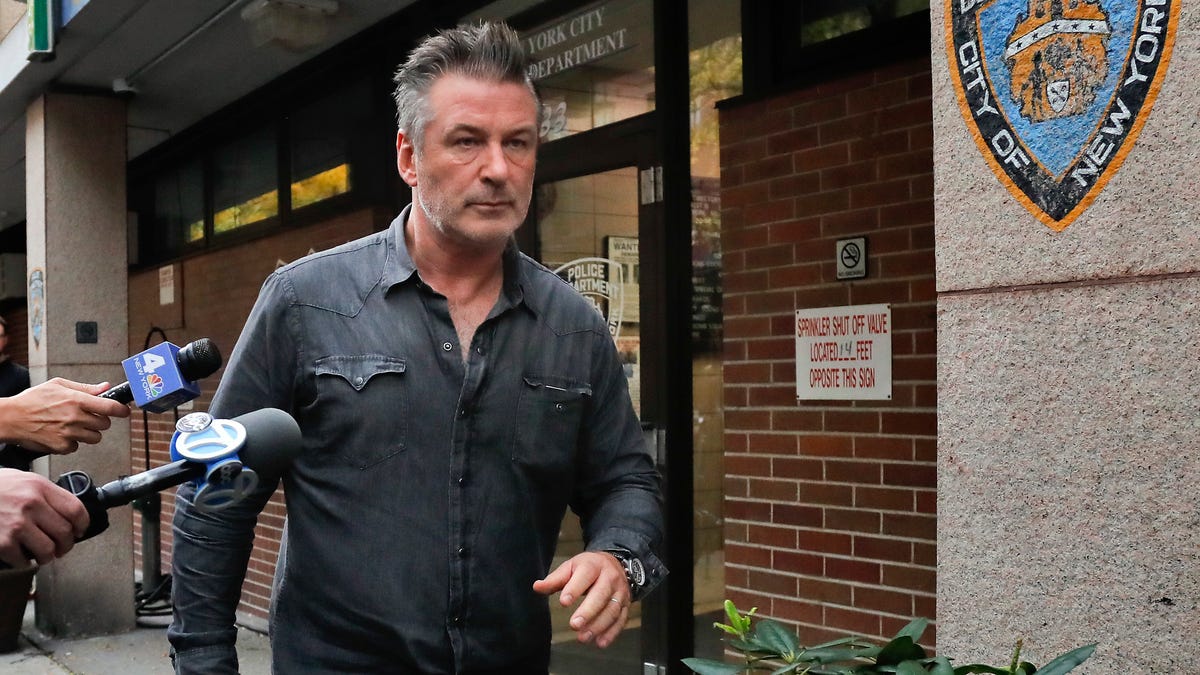 Alec Baldwin walks out of a New York police precinct on Nov. 2, 2018 after he was arrested following a parking dispute outside his home.