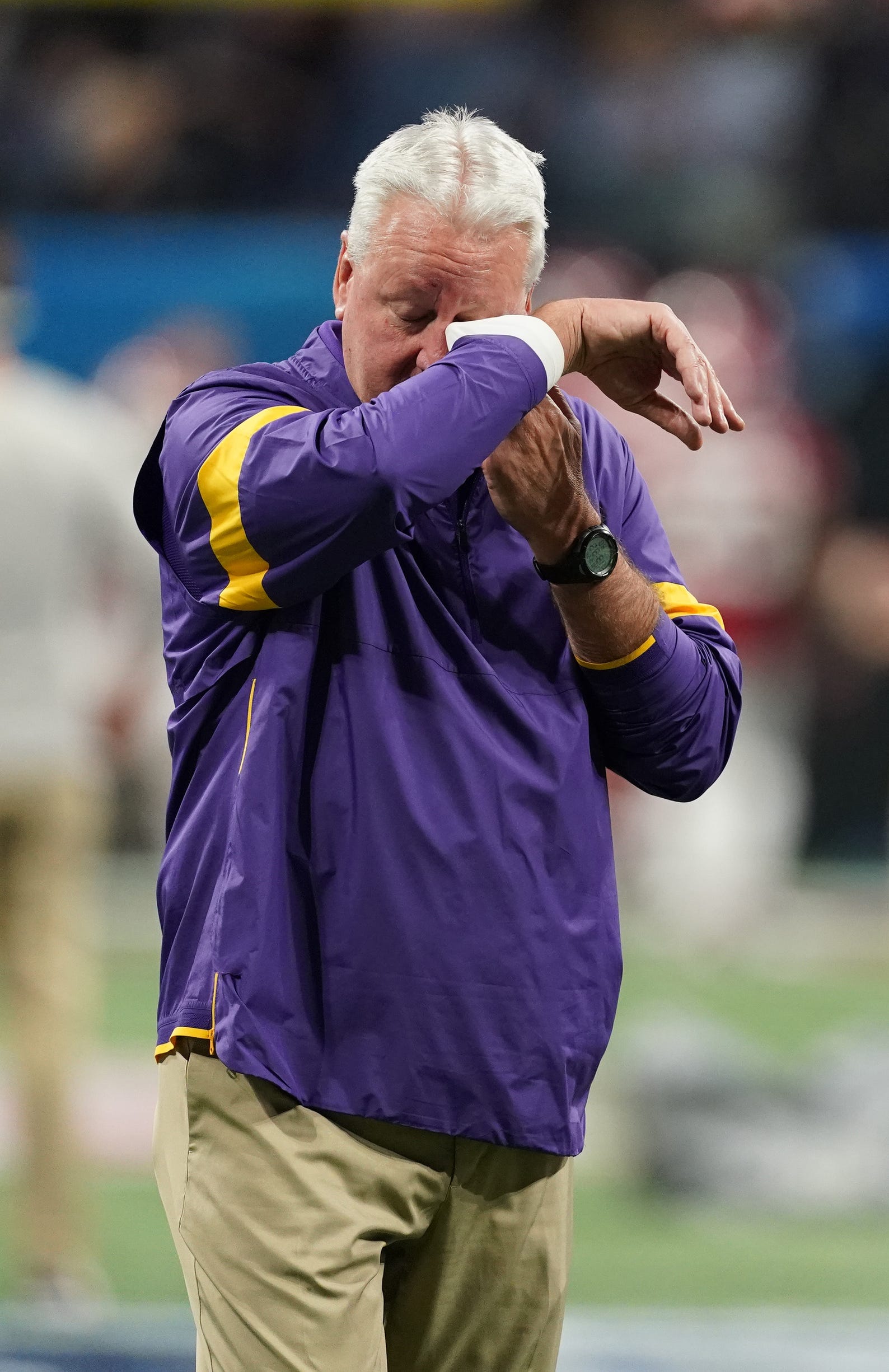 Dec 28, 2019; Atlanta, Georgia, USA; LSU Tigers offensive coordinator/quarterbacks coach Steve Ensminger reacts before the 2019 Peach Bowl college football playoff semifinal game against the Oklahoma Sooners. Mandatory Credit: John David Mercer-USA TODAY Sports