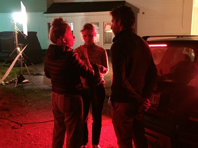 Stefanie Abel Horowitz, director of 'Sometimes, I Think About Dying,' talks to actors Jim Sarbh and Katy Wright-Mead on set in Maine.