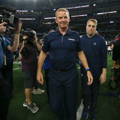 Dallas Cowboys head coach Jason Garrett walks off 
